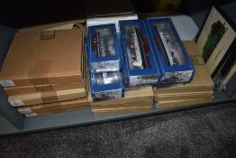 A shelf of Railway related collectors plates and prints along with decorative models of Ocean