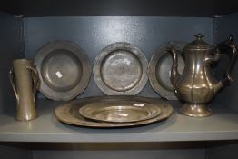 A fine selection of pewter wares including large R Baldwin charger and tudric styled vase