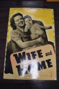 A large vintage tin advertising sign depicting mother and child 'The married woman's magazine'.