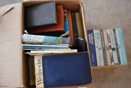 A collection of books,amongst which are predominantly of local interest.