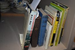 A selection of volumes reference books including Wainright fell wanderer