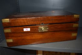 A large sized antique writers compendium having brass fitments and compartmental internals
