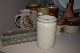 A collection of salt glazed stone ware, including jugs and pots and more.