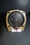 An Elgin Pioneer dashboard or similar cockpit aviation clock instrument