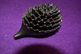 A set of nesting Walter Bosse style cast metal hedgehog ashtrays, Six in total.