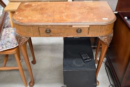 An early 20th Century walnut side table, having frieze drawer, width approx. 78cm