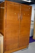 A 1930s golden oak double wardrobe approx. width 120cm