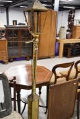 A vintage brass standard lamp, modelled as street lamp, approx. height 173cm