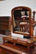 A Victorian mahogany toilet mirror, having shallow drawer base, width approx. 53cm