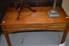 An early to mid 20th Century oak coffee table, approx. length 92cm