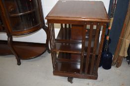An Edwardian mahogany revolving bookcase having crossband inlay, approx. width 48cm