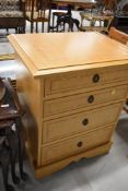 A modern golden oak bedroom chest of four drawers, approx. Width 65cm