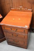 A modern mahogany effect chest of three bedside drawers, width approx. 50cm