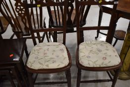 A pair of late 19th/early 20th Century mahogany bedroom chairs
