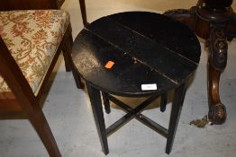 A rustic folding occasional table, open diameter approx. 38cm
