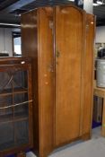 A vintage light oak wardrobe