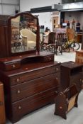 A modern mahogany dressing table and bedside cabinet, by Rossmore, and a mahogany effect and