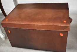 A vintage leather travel trunk, approx. dimensions 69 x 48 x 39cm , unlabelled but lined and looks