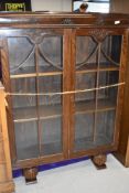 An early to mid 20th Century oak display cabinet, approx. width 91cm