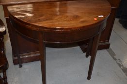 A 19th Century mahogany demi lune fold over table, approx width 91cm, open diameter 89cm , some
