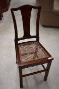A late Victorian/Edwardian mahogany cane seated bedroom chair