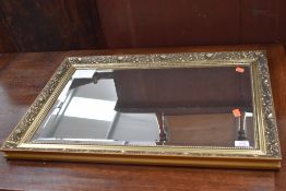 A gilt framed wall mirror, approx. 76 x 53cm
