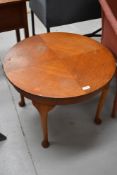 A mid 20th Century coffee table, on cabriole legs, diameter approx. 61cm