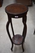 An early 20th Century oak plant stand, height approx. 94cm