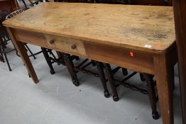 A traditional pine side table, refurbished with replacement drawer, dimensions approx. width 178cm