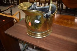 A traditional brass coal helmet