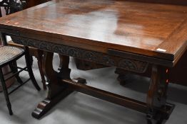 An early to mid 20th Century oak draw leaf dining table, in the refectory style, approx. 121 x