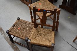 Two seagrass stools and a similar child's chair