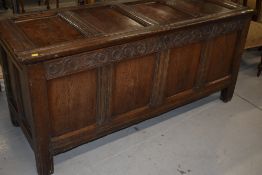 A period oak kist/coffer, having panelled sides, with carved frieze, LTA 1689, lock mechanism