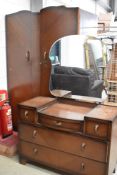 A mid 20th Century oak and ply wardrobe and dressing table