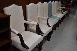 A set of eight (four plus four) upholstered dining chairs and an additional similar chair