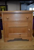 A pine bedside locker, of wide proportions, approx. 57cm , 34cm deep, 60cm height