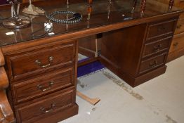 A high quality modern oak effect dressing table and wall mirror, approx. Width 175cm, also