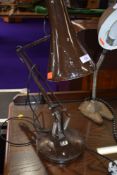 A vintage Herbert Terry style angle poise desk lamp on cast base, labelled for BHS