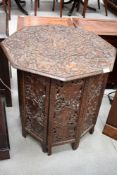 An Arts and Crafts carved folding table, really detailed foliate carving, diameter approx. 62cm