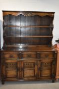 A nice quality reproduction solid oak dresser, approx. width 136cm