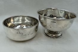 A silver bowl of plain form inscribed Hilarry 19.10.30, Birmingham 1928, William Neale, and a silver