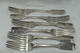 Six Victorian silver table forks of fiddle back design bearing monogram B to terminals, London 1855,