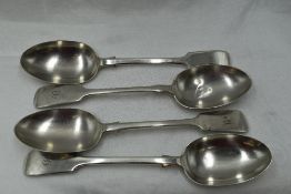 Four Edwardian silver table spoons of fiddle back form bearing monogram M to terminals, London