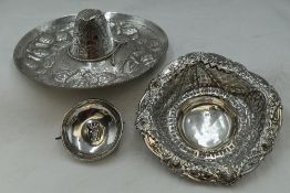 A Mexican silver trinket modelled as a Sombrero, an HM silver trinket dish having extensive