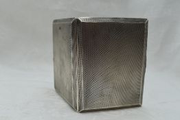 A 1930's silver cigarette case having engine turned decoration to both inside and out, push clasp