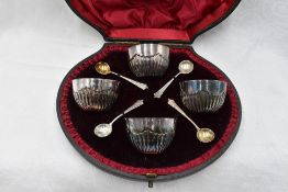 A cased set of four Victorian silver salts of bowl form having gadrooned decoration, London 1896/
