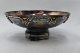 A silver bowl having rope wire grape vine decoration and a turreted pedestal foot, Birmingham
