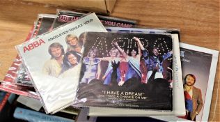 A lot of two carrying cases containing seven inch singles - various genres