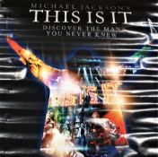A lot of 2 Michael Jackson posters - one rolled and sealed and one unrolled to photograph ,