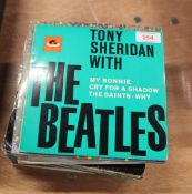 A nice lot of original UK Beatles 45's with some rare picture sleeve ep's